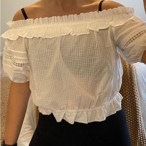 Cute white top with ruffled sleeves and collar